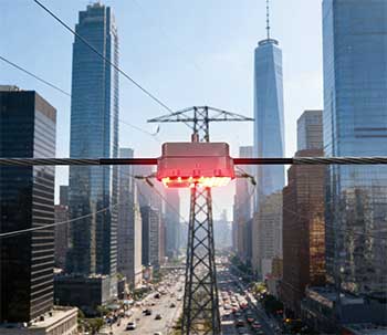 适配复杂环境：高压取电防外破警示装置守护各类输电廊道